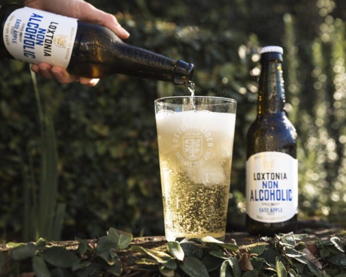Loxtonia Easy Apple Non-Alcoholic Cider pouring shot LR